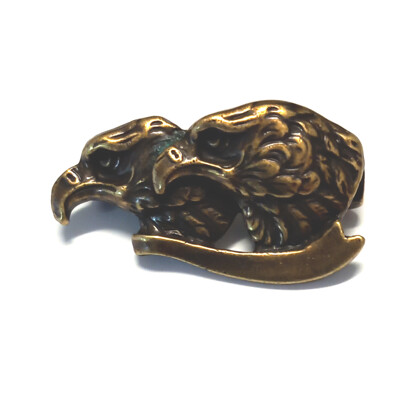 59. Hlavy orla, stuha , mosaz